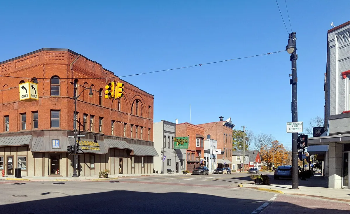 The northwest corner of the main two roads that cross in Fowlerville, MI.