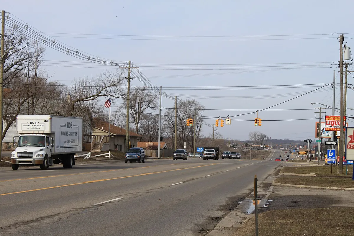 White Lake Township, Highland Road at Porter Road, facing west, Michigan.
